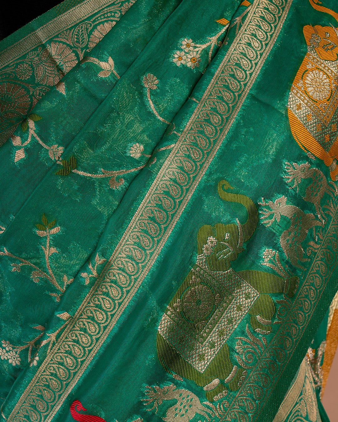 Emerald Green Banarasi Saree with Elephant Motifs - Step into Royalty with Every Pleat