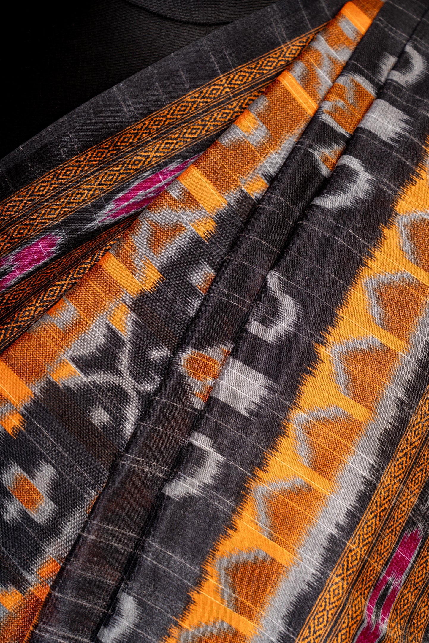 Fire & Threads – Vibrance Woven in Ikat Elegance