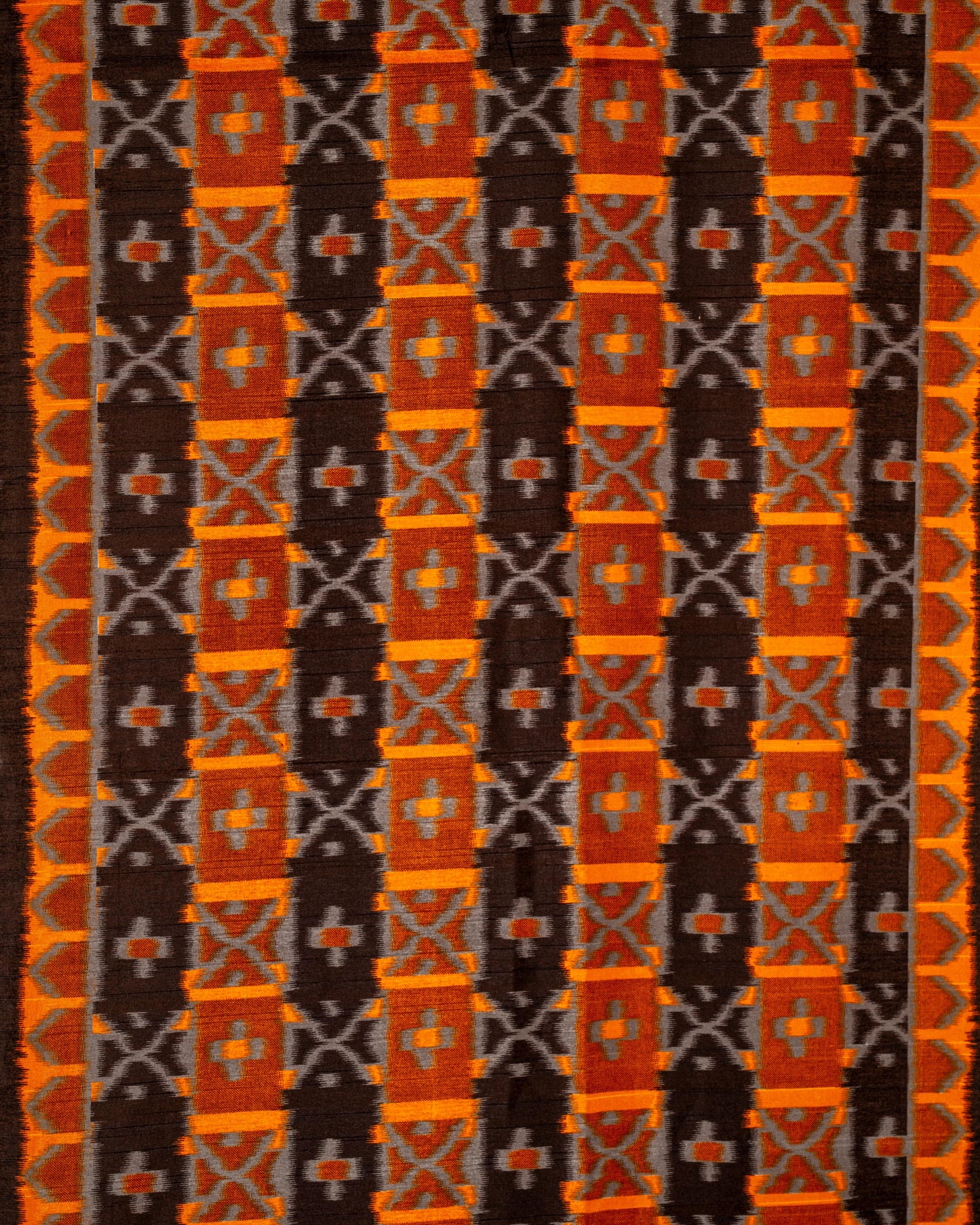 Fire & Threads – Vibrance Woven in Ikat Elegance