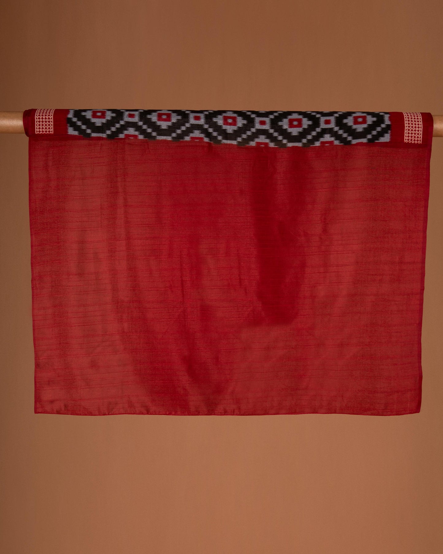 Bold Elegance in Every Drape - Handwoven Black Ikat Saree with Striking Red Accents
