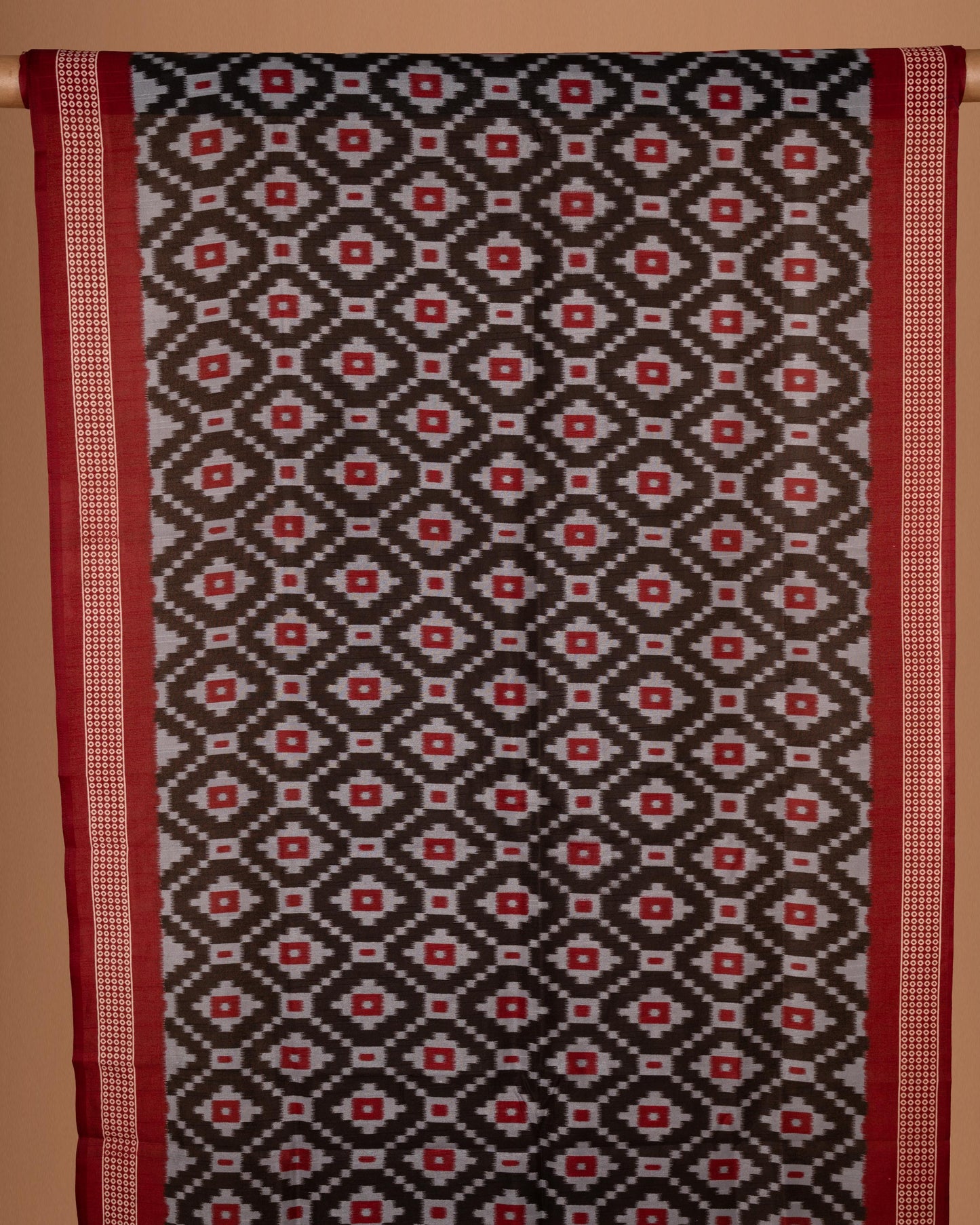 Bold Elegance in Every Drape - Handwoven Black Ikat Saree with Striking Red Accents